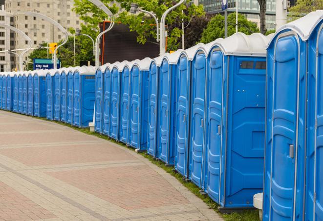 a row of portable restrooms at a trade show, catering to visitors with a professional and comfortable experience in Agua Dulce